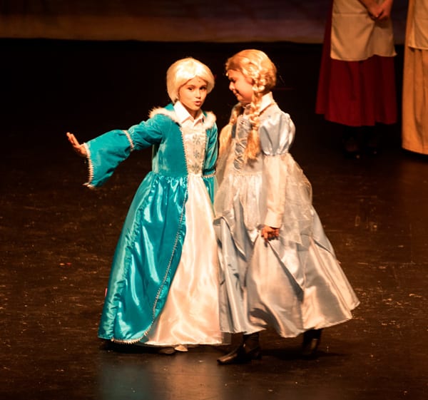Here are the young Princesses Elsa and Anna played by MaKenzie Wynn and Corlyn Stauffer.