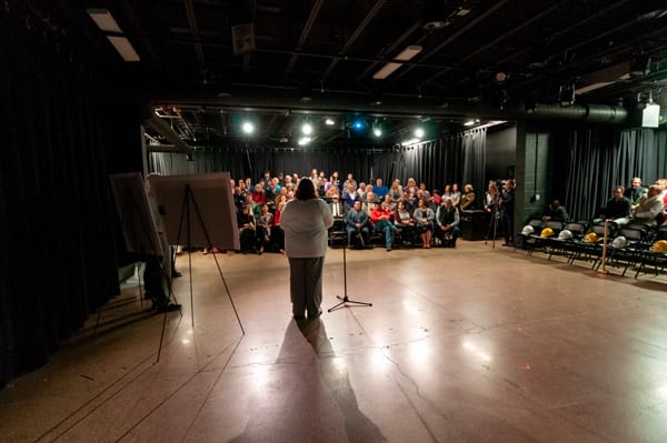 The event began in Theatre 166 with speeches and a full crowd in attendance.