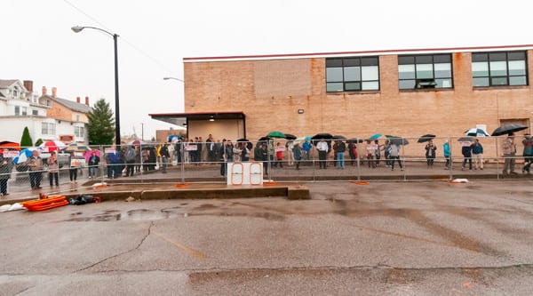 The festivities moved outside, where onlookers were greeted with a wet, windy, and cold day.