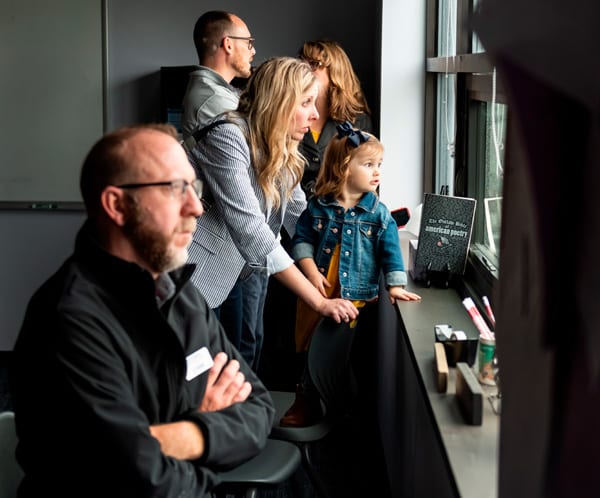 Some onlookers got the best seat in the house - watching from the second floor of Theatre 166.