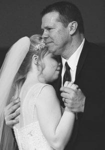 Audrey and her dad on her wedding day